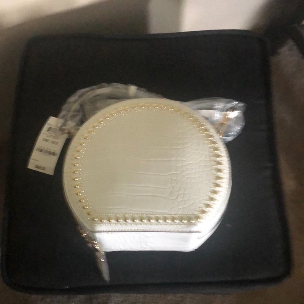 Inc round purse